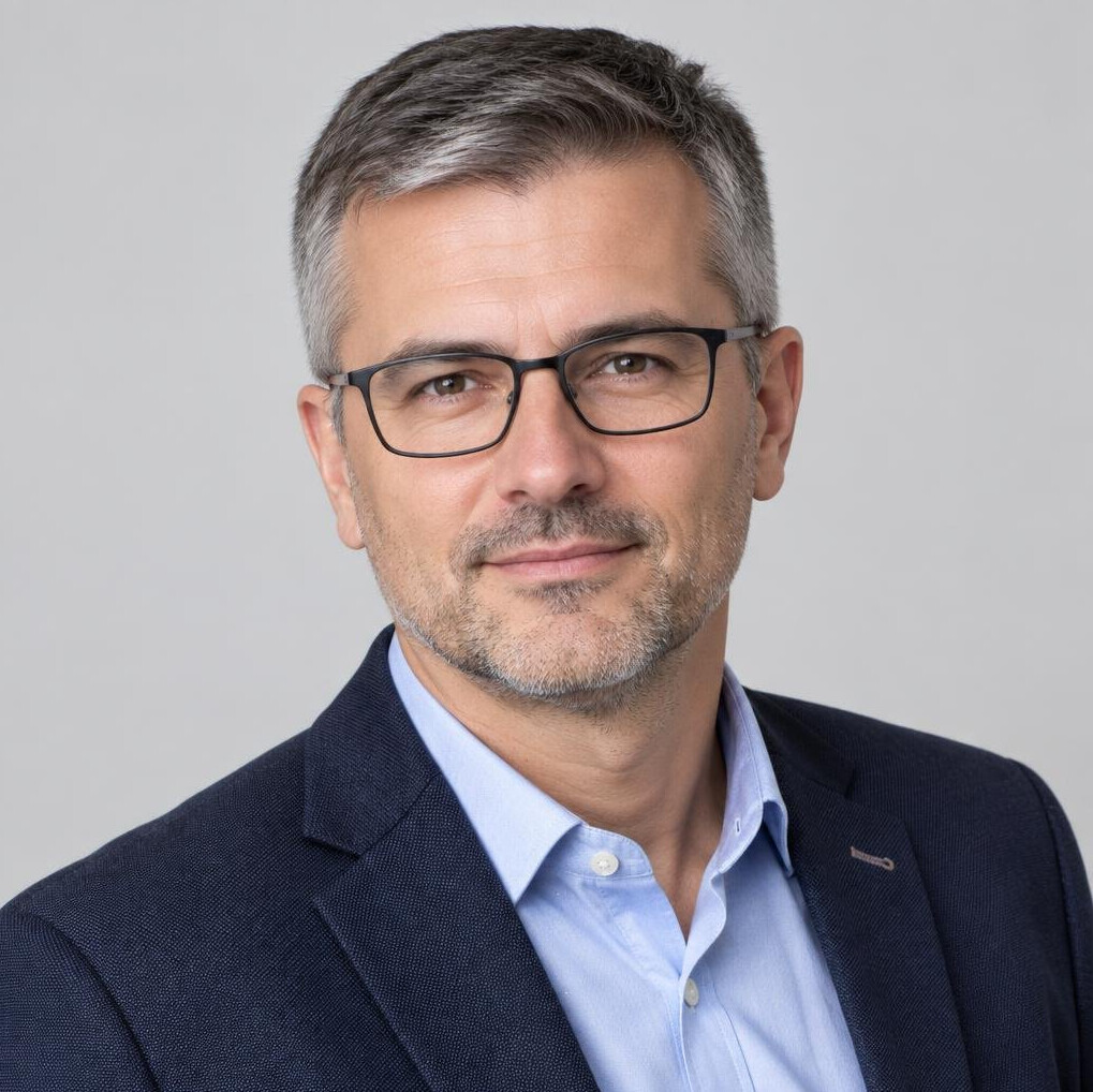 Portrait of a middle-aged European man with glasses